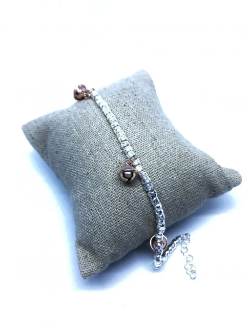 Bracciale con Pepite Martellate Tonde e 3 Campanellini Rosè