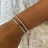 Bracciale Rondelle e Nodi COLORE ARGENTO Bianco QUANTITÀ NODI 3 nodi
