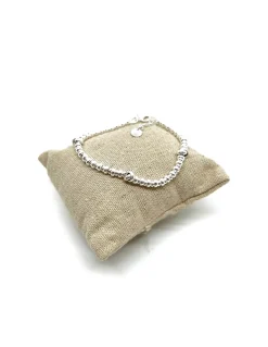 Bracciale Rondelle e Nodi COLORE ARGENTO Bianco QUANTITÀ NODI 3 nodi