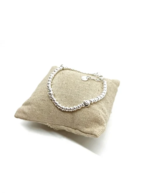 Bracciale Rondelle e Nodi COLORE ARGENTO Bianco QUANTITÀ NODI 3 nodi